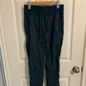 Dark blue ish green lululemon studio pants